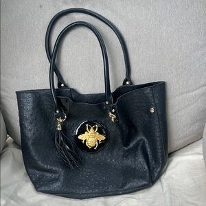 Elegant Black Tote Bag with Gold Bee Accent